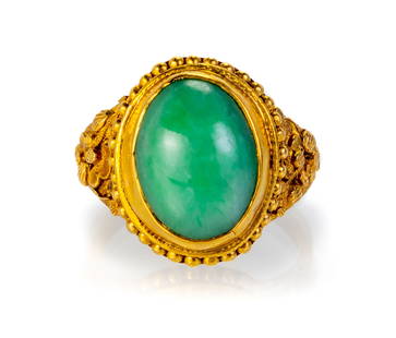 Chinese Jade ring: 22k yellow gold Chinese bezel set jade cabochon ring with carved flowers on the sides. Ring Size: 6.25. Markings: 22kt, illegible stamp. Total weight: 4.9 dwt (7.6 g). Please note: All property is sol