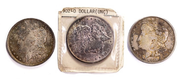 Three (3) US Morgan Silver Dollars