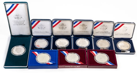 Nine (9) US Commemorative Silver Dollar Coins
