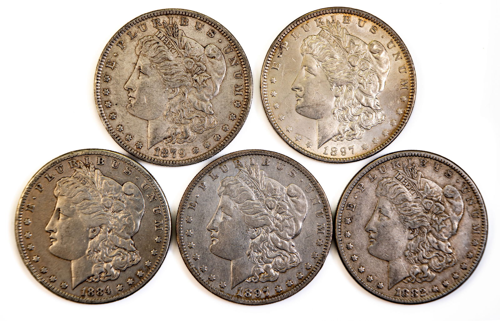 Five (5) Morgan Silver Dollars inc 1884 S (1 of 2)