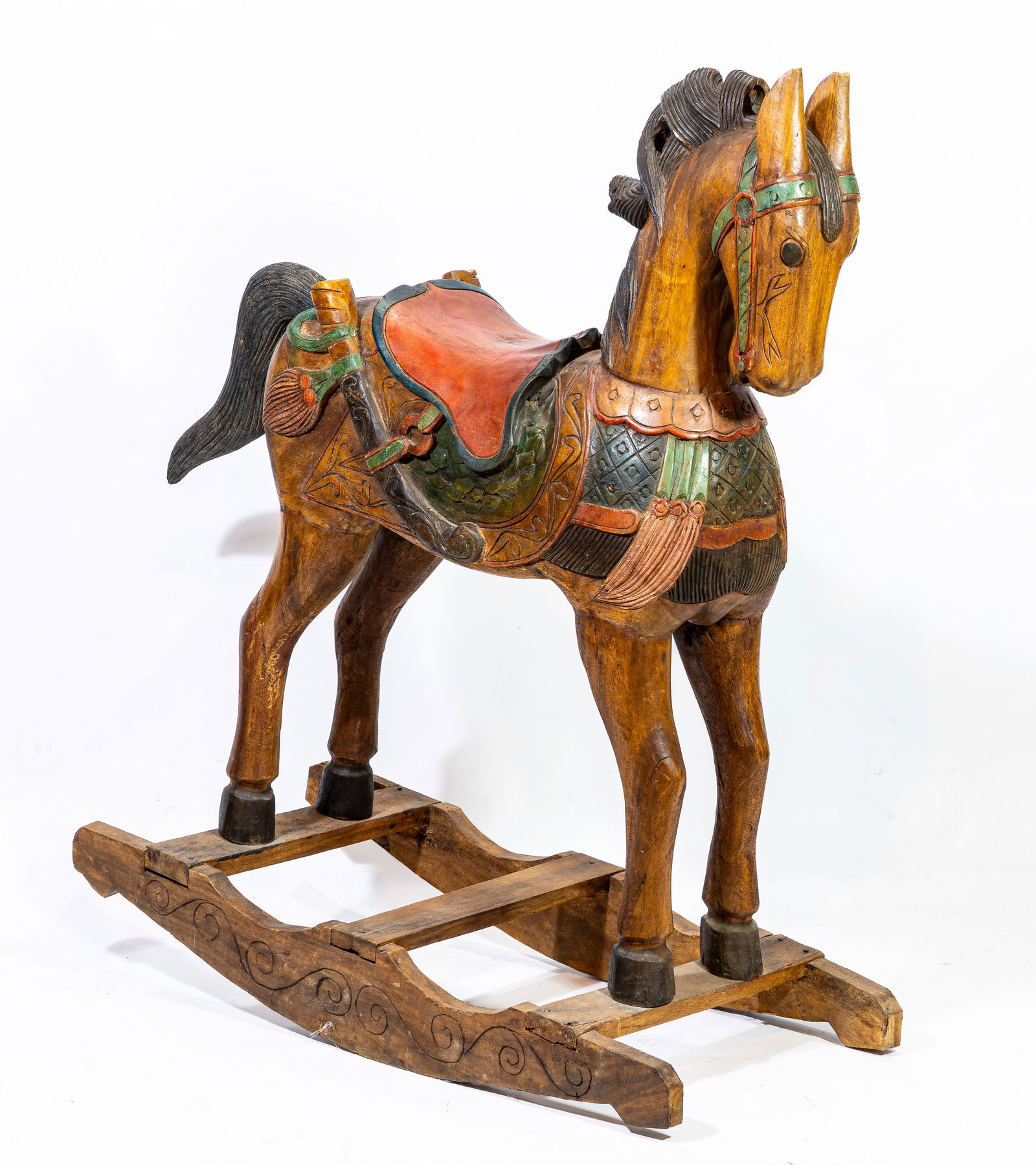 Vintage Poychrome Carved Wood Rocking Horse: Vintage poychrome carved wood rocking horse.