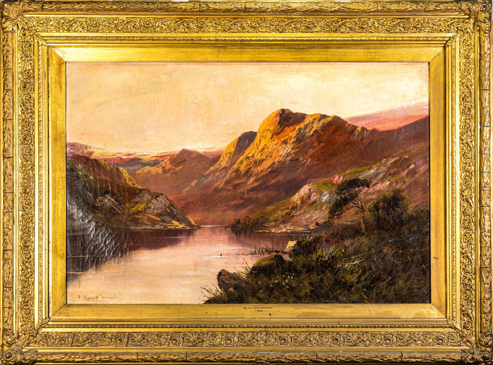 R. Henry Jermain (English, Late 19th-Early 20th C.) Oil on canvas: R Henry Jermain oil on canvas. Landscapeof a lake and mountainous terrain. Signed lower-left "R Henry Jermain." Original frame with name and dated 1922. View size: 19 x 29.25 in. Gilt wood and gesso f