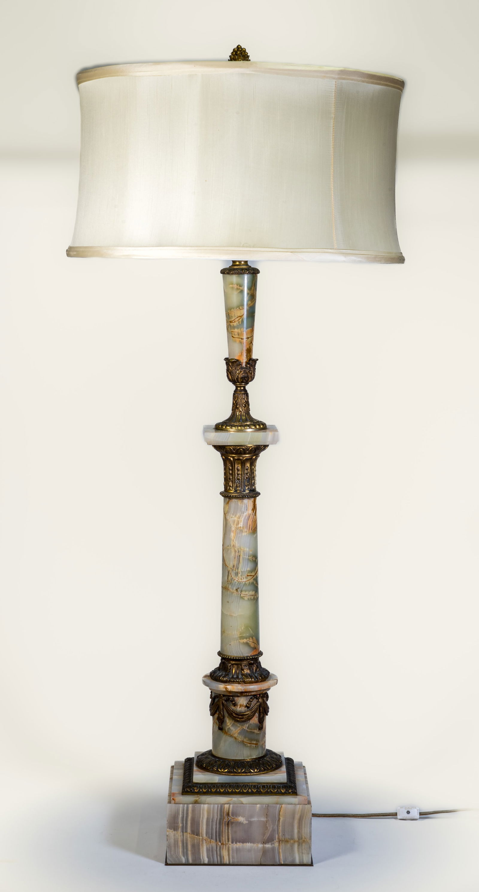 Tall Onyx and Brass Lamp: A mid-20th-century tall onyx and brass-mounted column form lamp. Very Heavy.