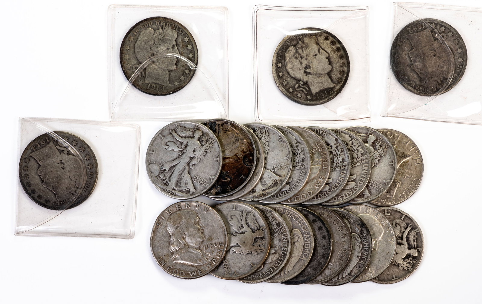 Twenty-Four (24) Mixed Lot Barber Franklin Walking Liberty Half Dollars: Mixed lot of twenty-four (24) 90% silver half dollars, all well circulated, including: Thirteen (13) Walking Liberty, four (4) Franklin, and seven (7) Barber. The Barbers are from the following years: