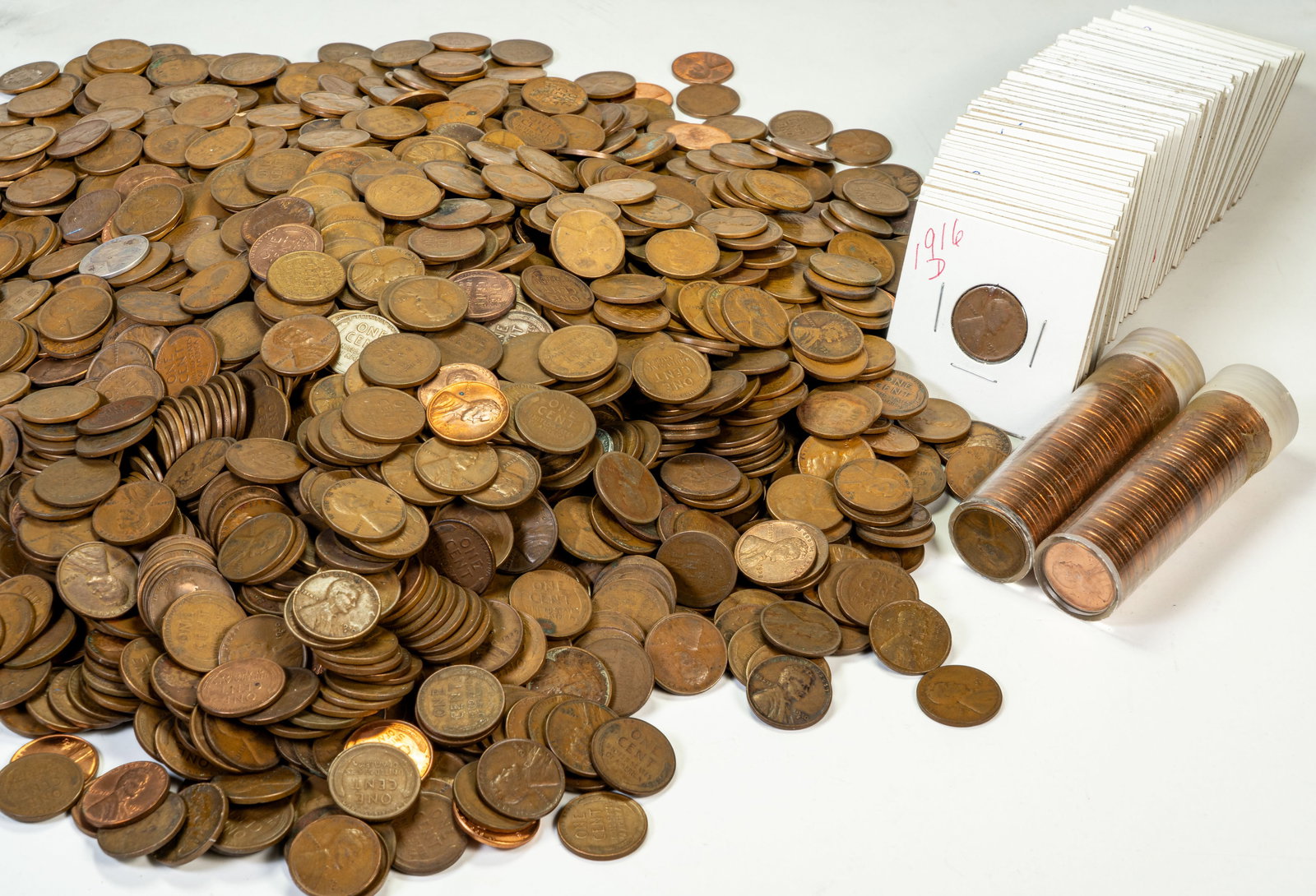 Large Lot (1,836) Wheat Pennies Not Checked $18.36 FV: Lot of 1,836 Wheat pennies. Fifty-four (54) are in cardboard with dates. There are 2 plastic tubes that are labeled "Wheat Errors". The errors are also not checked. Total $18.36 face value. They weigh