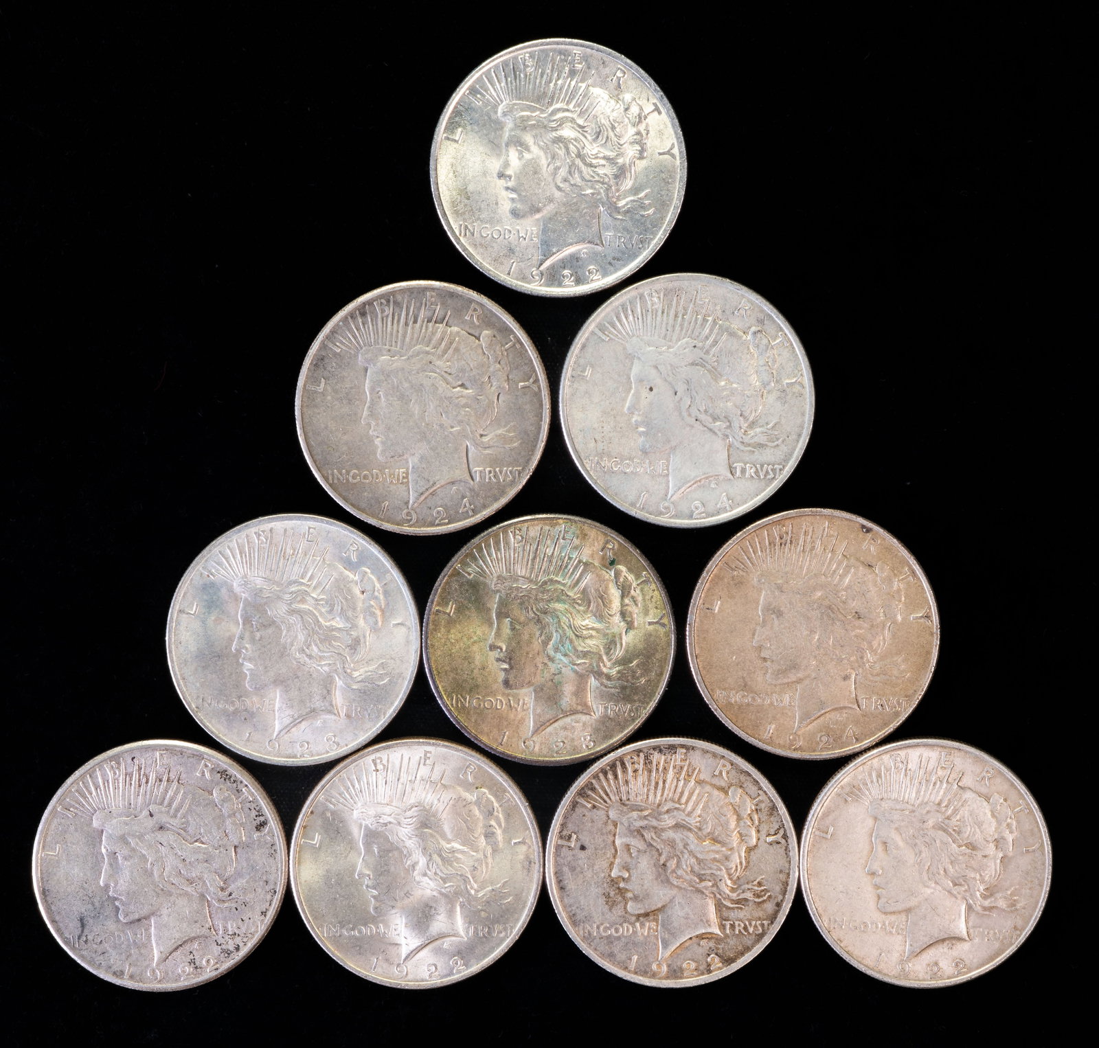 Ten (10)Liberty Peace Silver Dollars Mixed Dates: Ten (10) Liberty Peace dollars. Years: four (4) 1922, 1922 S, 1923, three (3) 1924, 1928.