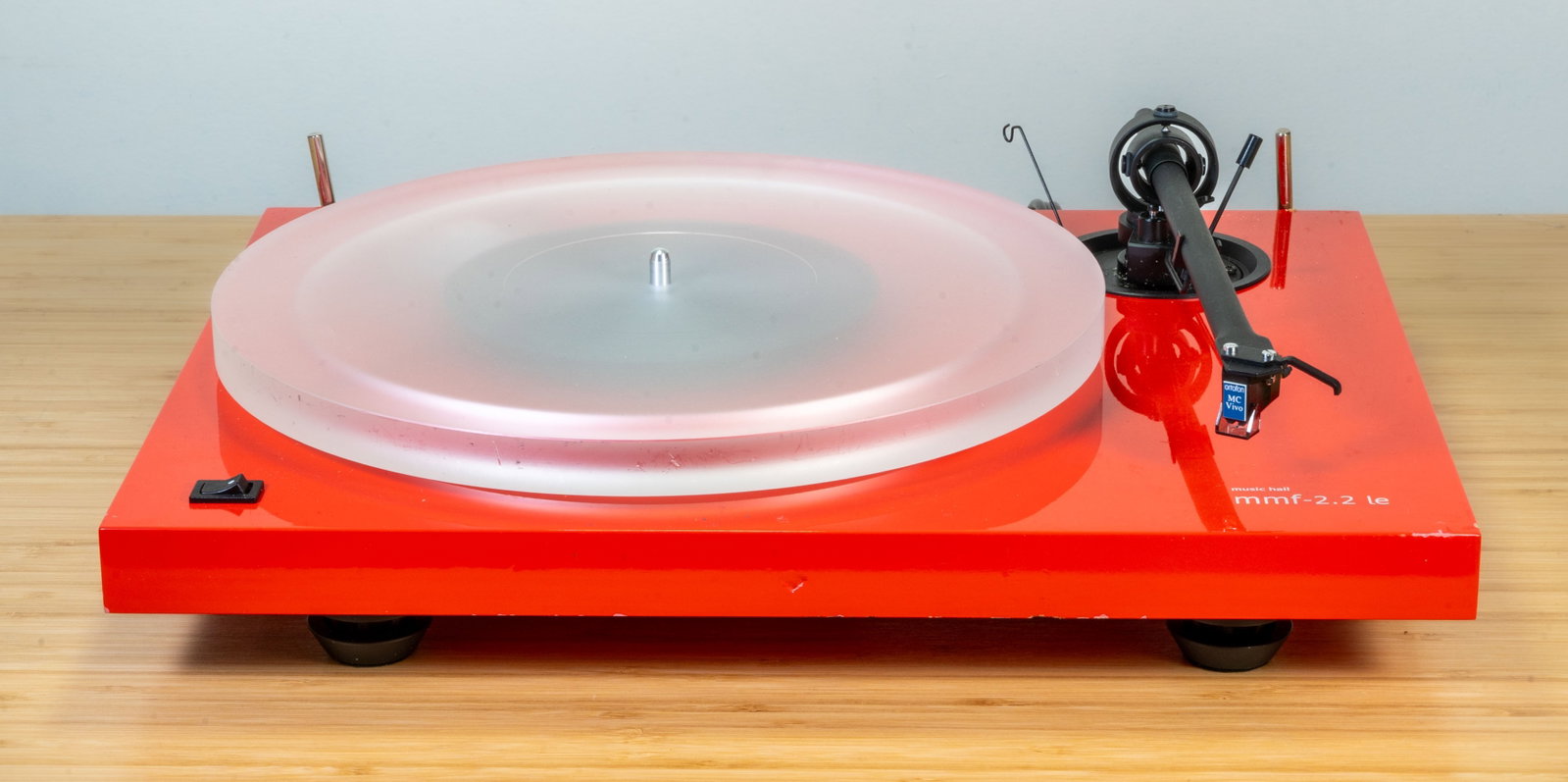 Music Hall mmf-2.2 le Turntable with Ortofon MC Vivo Cartridge: Red Music Hall MMF-2.2 le Turntable with Ortofon MC Vivo Cartridge. No cover. Property from the Collection of Robert Robinson For more information on The Robert Robinson Collection: Engineering the