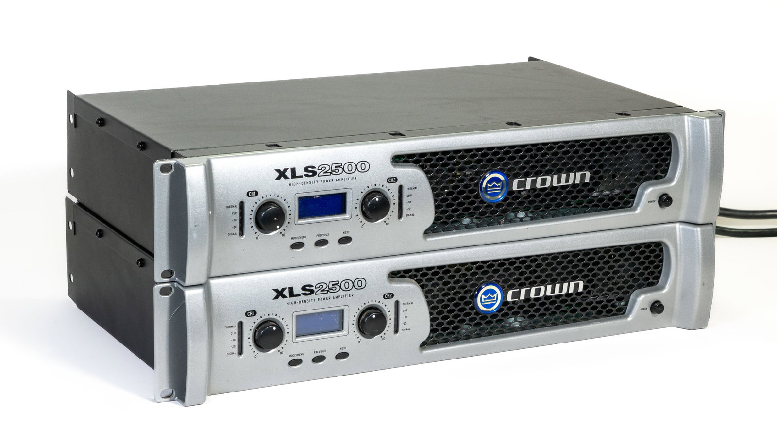 Pair of Crown XLS 2500 Amplifiers: Pair Crown XLS 2500 Amplifiers.Each 1550 watts RMS (mono) at 8 ohms in bridged mode built-in PureBand Crossover System balanced XLR, 1/4", and RCA inputs Property from the Collection of Robert