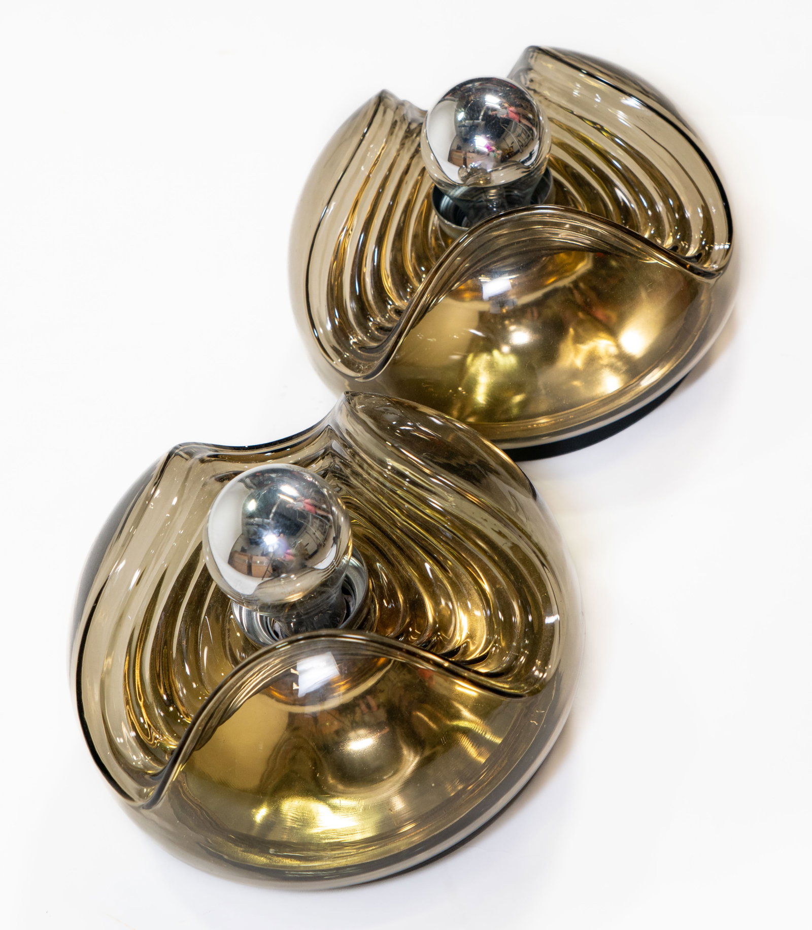 Pair of Pell and Putzler Smoked Glass Sconces: Pair of 1970's Koch and Lowy by Pell and Putzler smoked glass biomorphic wall light sconces.