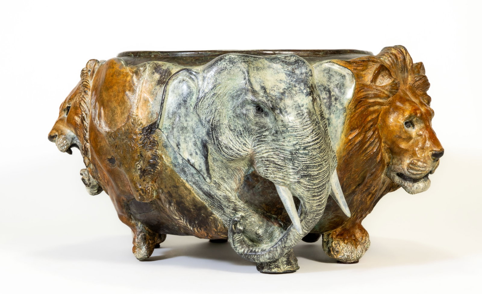 Genryusai Seiya Painted Bronze Animal Jardiniere: Genryusai Seiya painted bronze Animal jardiniere, Meiji era (1868-1912), early 20th century. Depicts a lion, tiger, elephant, baboon, buffalo, bear, and deer. Original cold paint patina. Stamped with