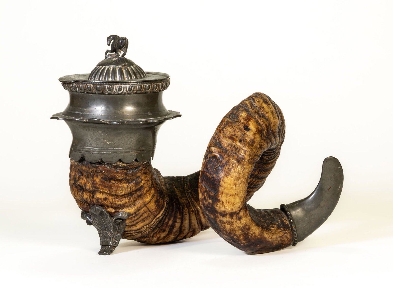 Ram Horn Snuff Mill: Antique Ram horn snuff mill with horse finial, pewter hinged top and end piece. Dimensions: 8.5 in. high x 10 in. long.