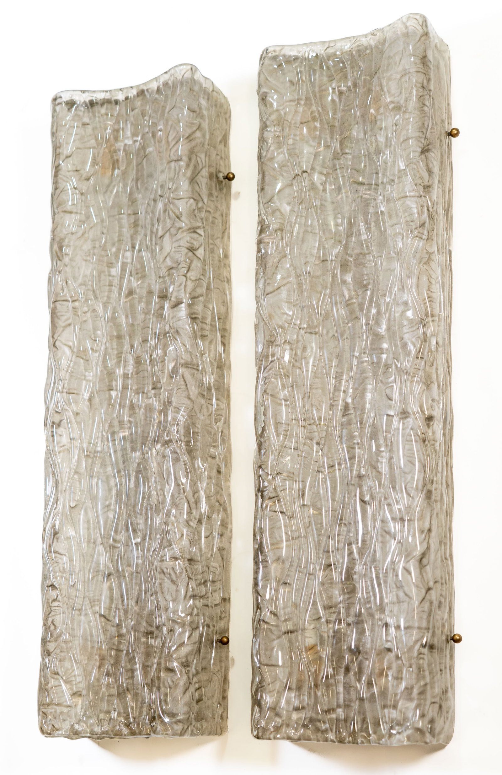 Pair of MCM Ice Glass Wall Sconces: Pair of Murano MCM Ice Glass wall sconces. Brass metal holder with four (4) lights, opaque plastic diffuser on inside front. Marked GW on top and bottom brass plates. Dimensions: 27.5 in. high x 7.5