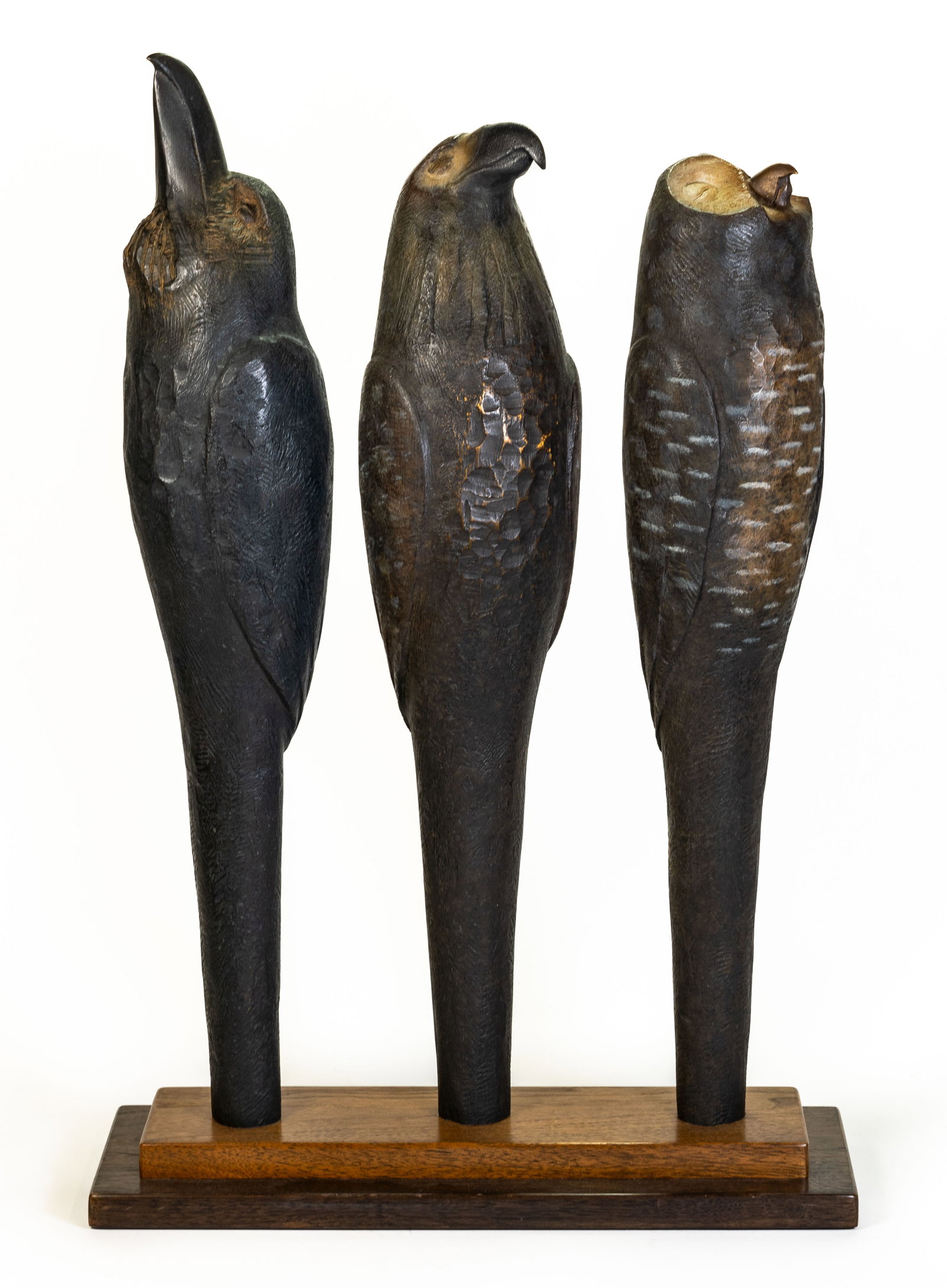 Hib Sabin (b. 1935) Bronze, "Dreaming Guardians": Artist:Hib Sabin (American, b.1935) Medium:Bronze Title: ?Dreaming Guardians" Subject: Three dreaming birds of prey mounted on a wood base Limited edition: no.3 of 15 Dimensions: 18.5 in. x base o