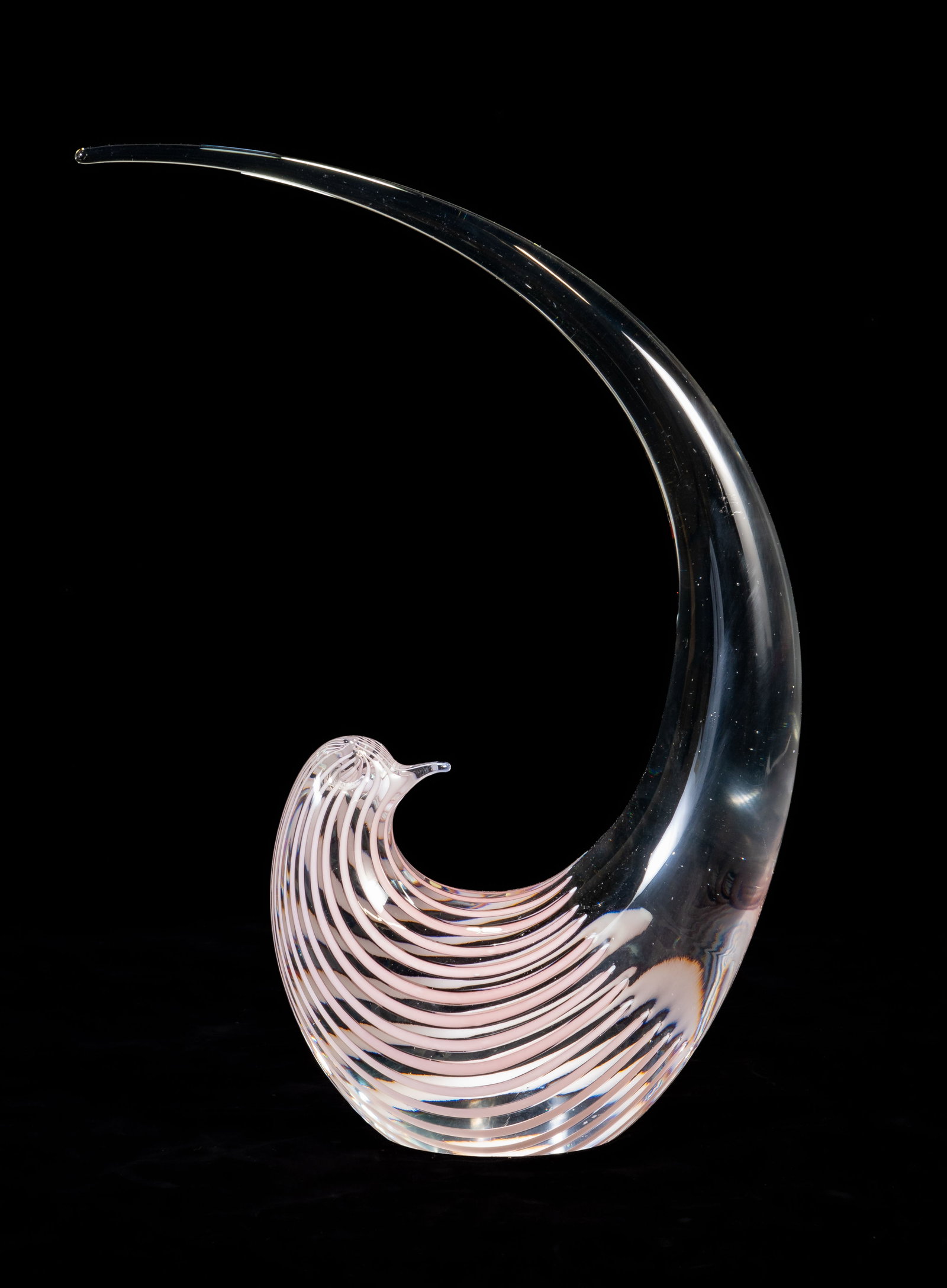 Murano Crystal Bird: Mid?20th c. Murano glass bird with colorless body and pink feathers from head halfway through. Unsigned. Measures 12.5 in. x 8 in. x 3 in. No damage or scratches.