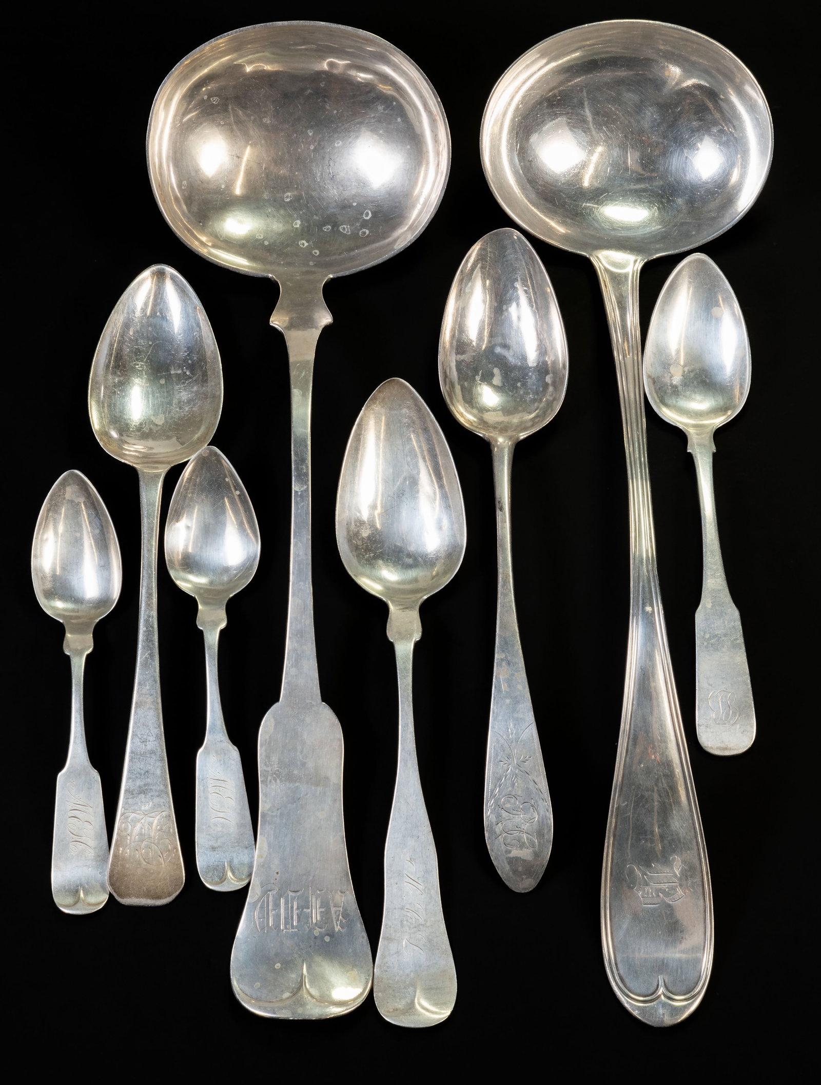 Eight Pieces American Coin Silver 19th C: Eight (8) pieces of 19th?c. American coin silver: 13.25 in. ladle (S.C. & J.S. Jett), 13 in. ladle (Dexter & Haskins), three serving spoons (Pitman, W. Moulton, J.M. Warden), three smaller spoons