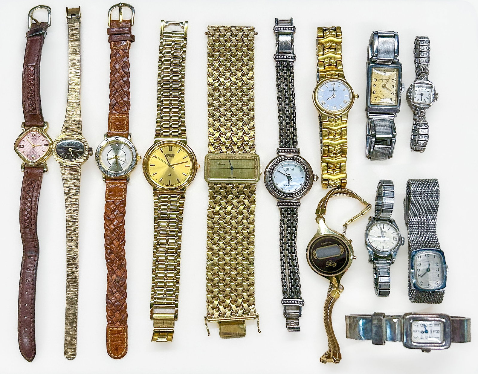 Ladies Watches: Thirteen (13) ladies watches: Citizen quartz, Jules Jurgensen, Gucci quartz, Seiko quartz, Admark Germany 17 jewels, Ecclissi sterling silver quartz, Movado, Alpina, Bulova, Mido Multifort, Timex, Obr