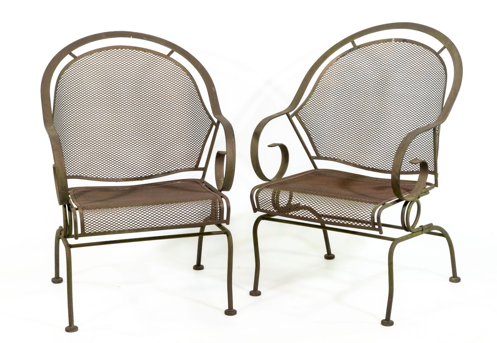 Pair Woodard Style Iron Rocking Armchairs: Pair of Russell Woodard style iron mesh rocking chairs. Very comfortable. Dimensions: 37 in. H x 24 in. W x 36 in. deep.