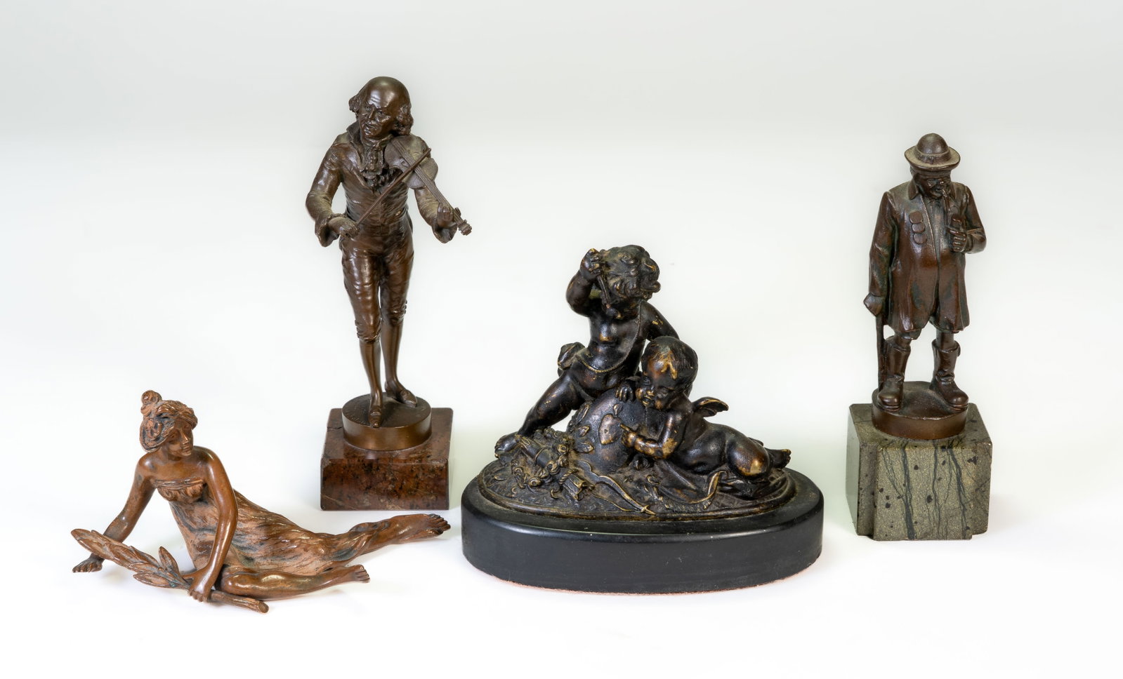 Four (4) Miniature Bronze Figires