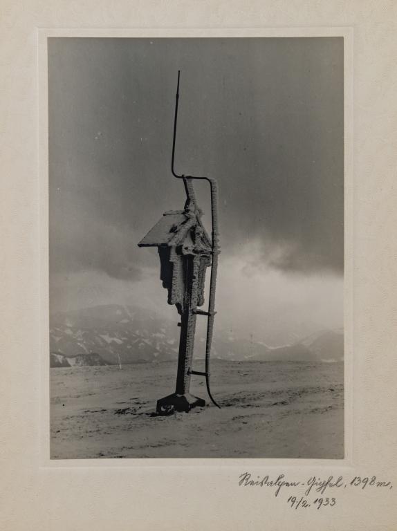 [ALBUMS] PORTFOLIO WITH 50 FINE ART PRINTS: A beautiful cloth box portfolio with 50 beautifully printed gelatin silver prints, ca. 1930s. Themes include snow mountain tops, European architecture and city landscapes. The images carry the aesthet