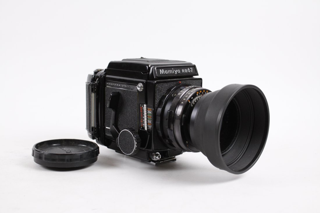 [CAMERAS MAMIYA RB67 PROFESSIONAL, JAPAN. (1970): [CAMERA] MAMIYA RB67 PROFESSIONAL. Japan. Circa 1970. No. C54189. Medium format (120). SLR with polarized filter. Rubber lens. 127 mm, f 3.8. With 120 film magazine (no dark slide). Waist-level viewfi