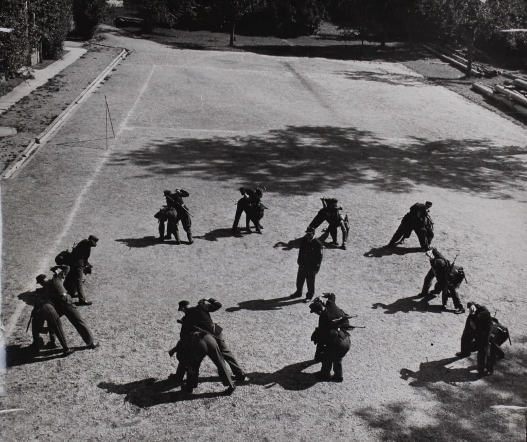 SEYMOUR, DAVID [CHIM]. GERMAN POLICE SCHOOL. 1948: SEYMOUR, David [CHIM]. GERMAN POLICE SCHOOL. 1948. Silver print hinged to mat. Verso with Seymour-Magnum backstamp and mounted caption label: "Germany today. At Furtstenfeldbruck, not far from Munich,