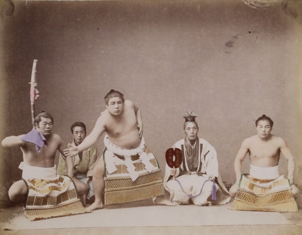 [JAPAN] SUMO WRESTLERS. 2 HANDCOLOURED ALBUMEN (1 of 6)