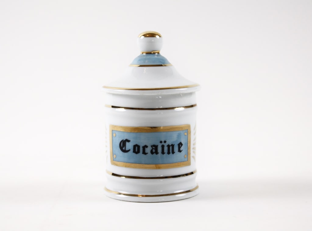 APOTHECARY JAR. COCAINE. LIMOGES, FRANCE: COCAINE APOTHECARY JAR. Limoges, France. Jar with lid. Empty. 5" x 3". Generally very good condition. *Additional images and detailed condition report available upon request.