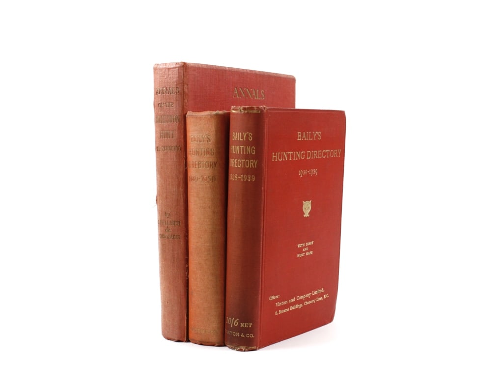 [HUNTING DIRECTORIES] LOT OF 3 VOLUMES TOGETHER: HUNTING DIRECTORIES. A lot of 3 volumes sold together. Red cloth boards. Including: 2 vols: BAILY'S HUNTING DIRECTORY. 1938-1939; 1949-1950. WITH DIARY AND HUNT MAPS. London: Vinton & Company, 1938; 1