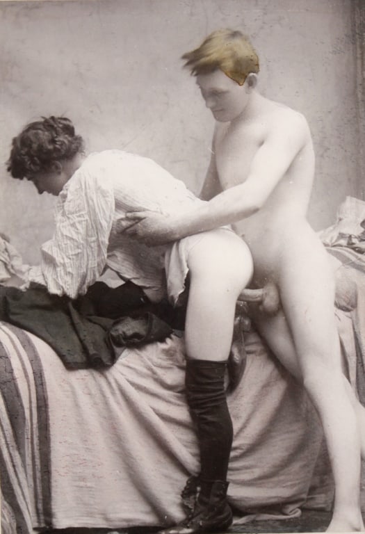 [EROTICA] SILVER PRINT: EROTICA. Silver print. Mounted with plastic corners to mat. Light handcolouring to man's hair. Print: 5" x 3.25". Generally very good condition, various imperfections. *Additional images and detailed