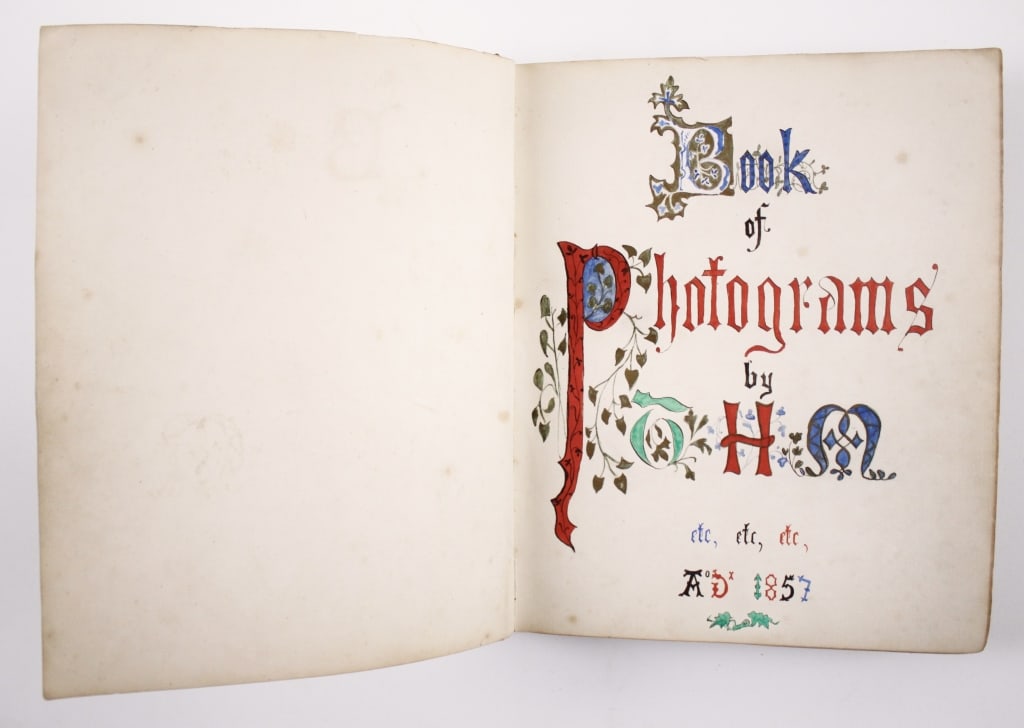 [EARLY ALBUM] BOOK OF FAMILY PHOTOGRAMS, 1857: FAMILY ALBUM: 'BOOK OF PHOTOGRAMS BY T.H.M; Rev. F. Digby Legard (English). Circa 1857. Includes handmade and handcoloured title and 46 albumen prints, most mounted, a few loose; many identified; most
