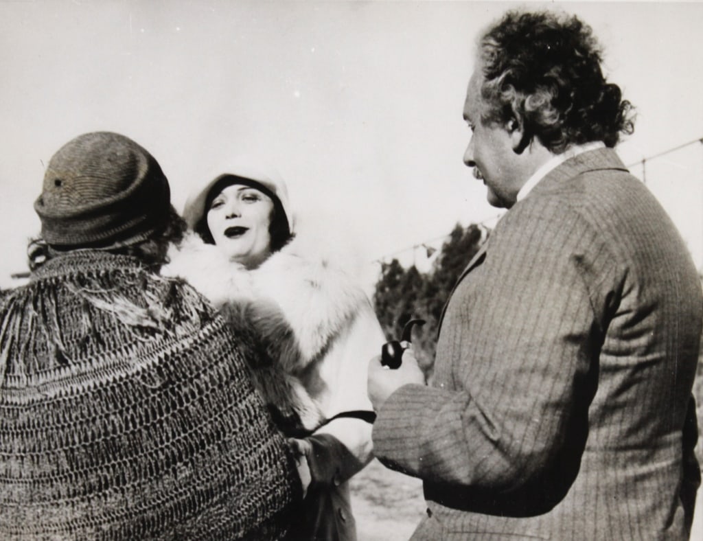 [FAMOUS] EINSTEIN, STRAVINSKY, SCHWEITZER, ETC. 5: FAMOUS PEOPLE. A lot of 5 silver prints sold together. Including: ALBERT EINSTEIN and actor POLA NEGRI. 1942. Matted, backstamp on print verso, typewritten caption label; Seymour, Jim (Pix). IGOR STRA