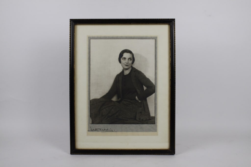 [WILDING, DOROTHY] LOT OF 2 PRINTS SOLD TOGETHER: WILDING, DOROTHY. A lot of 2 portraits of same woman sold together. Silver prints. Both framed, mounted on tissue sheets. Wilding's signature reproduced on bottom left. Prints: approx. 28 x 21-22.5 cm