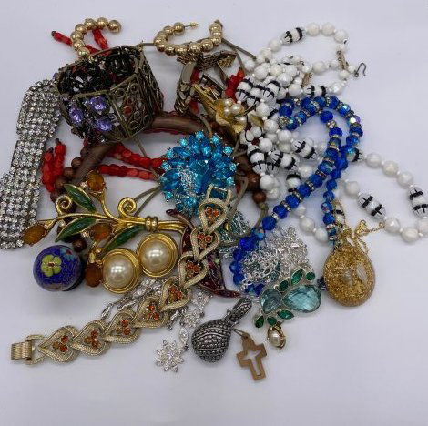 Lot of Sellable Costume: This is a lot of sellable costume jewelry. Coro, Trifari and lots of other great things. Maybe a stone missing here & there. Nice Czech long belt buckle. Nice lot. This sale is online only-no public p