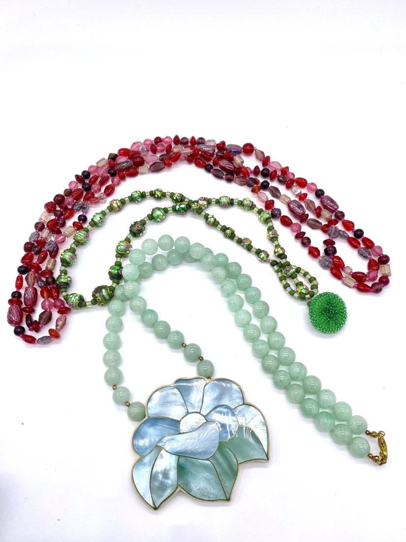 Venetian Beads, Jade Beads, Glass Beads: This Group of three necklaces consist of red art glass beads measuring 50". Flower necklace with Jade beads 22" wearable length with 3" wide flower and 16" Venetian beads choker necklace. All in good
