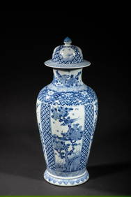 covered vasein white porcelain decorated on a cobalt blue background with a grove of flowers (1 of 6)