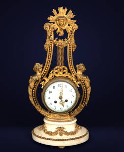 White marble and gilt bronze lyre clock, 19th century: Dimensions: 49 × 26 × 13 cm. White marble and gilt bronze. This refined 19th-century lyre-shaped clock stands out for its combination of white marble and gilt bronze, with ornamental details that al