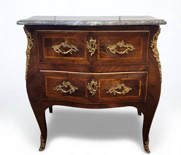 “Sauteuse?? Chest of Drawers – French School, 18th Century Louis XV: Rosewood, bronze, and marble. A magnificent two-drawer sauteuse chest, made in France in the late 18th century, representative of the Louis XV style due to its curved profile, refined ornamentation, a