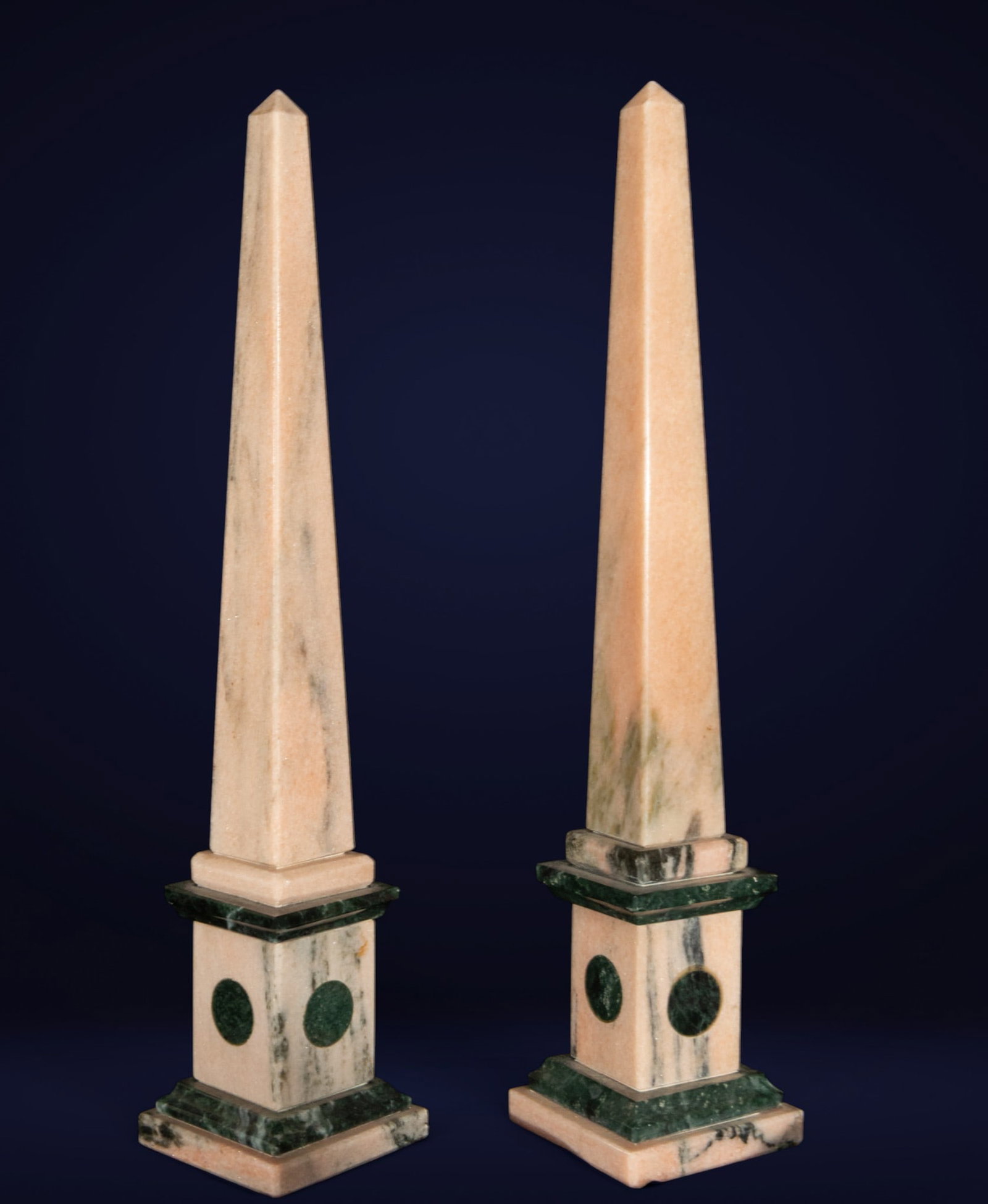 Pair of Elegant Italian Neoclassical Obelisks from the 19th Century: Pink and green veined marble. Dimensions: 33 x 7 x 7 cm. Set of two obelisks with square bases and elongated shafts, crafted from contrasting marbles. The design combines geometric elegance and chroma