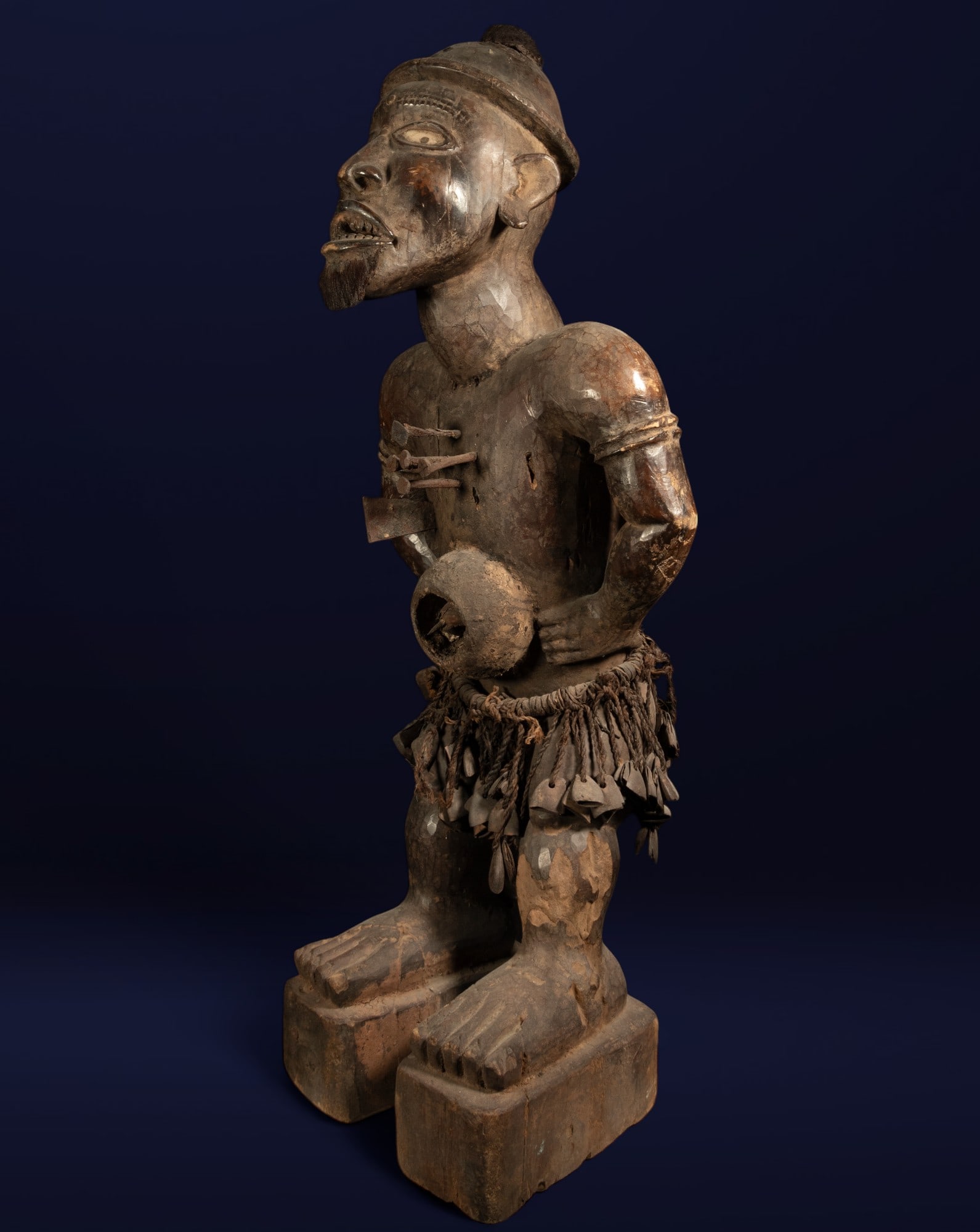 Very Rare and Large African Bakongo Congo Power Fetish, late 19th / early 20th century: Made of wood, iron nails, and fabric. Dimensions: 88 x 35 x 20 cm. Provenance: Important European private collection.