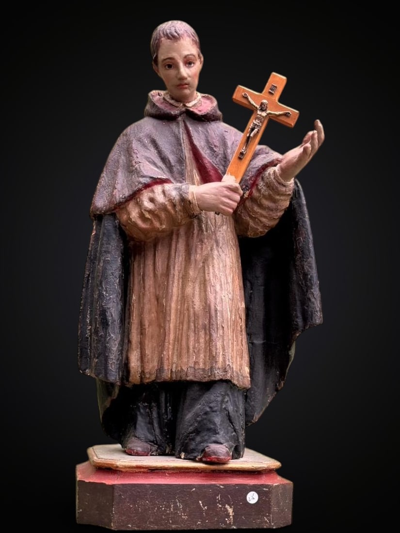 Saint Aloysius Gonzaga. Spanish School. 17th Century: Carved and polychromed wood. Dimensions 47 x 22 cm. Spanish Baroque sculpture from the 17th Century representing Saint Aloysius Gonzaga, a revered Jesuit saint known for his devotion, purity and care