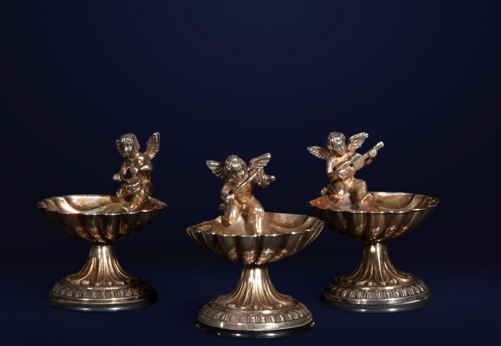 Trio of silver cherub musician trays. 19th century. (1 of 5)
