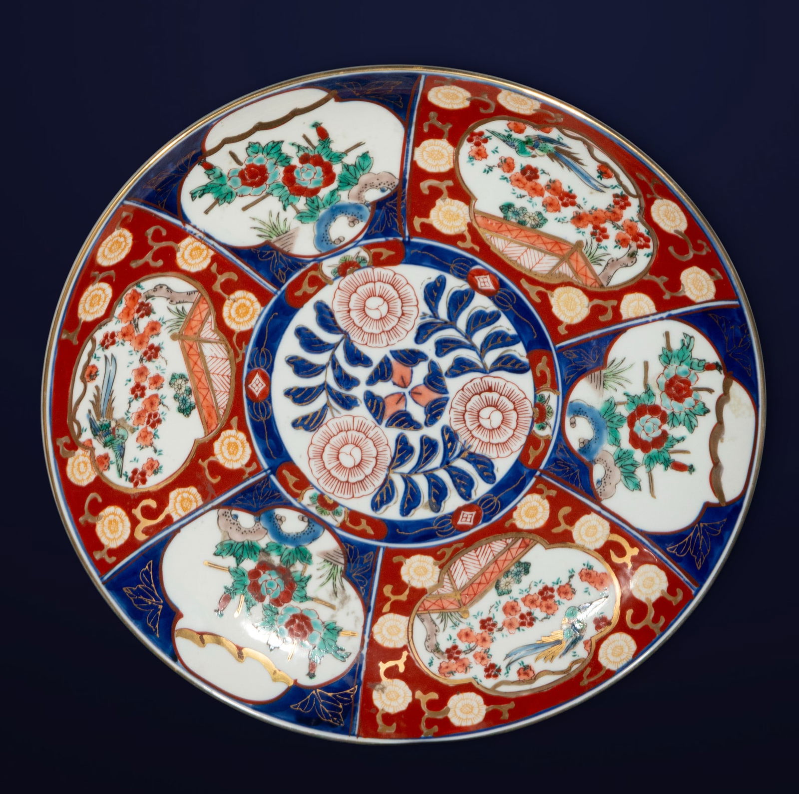 Large Imari porcelain plate painted with a peacock motif. Japanese school. 19th century. (1 of 7)