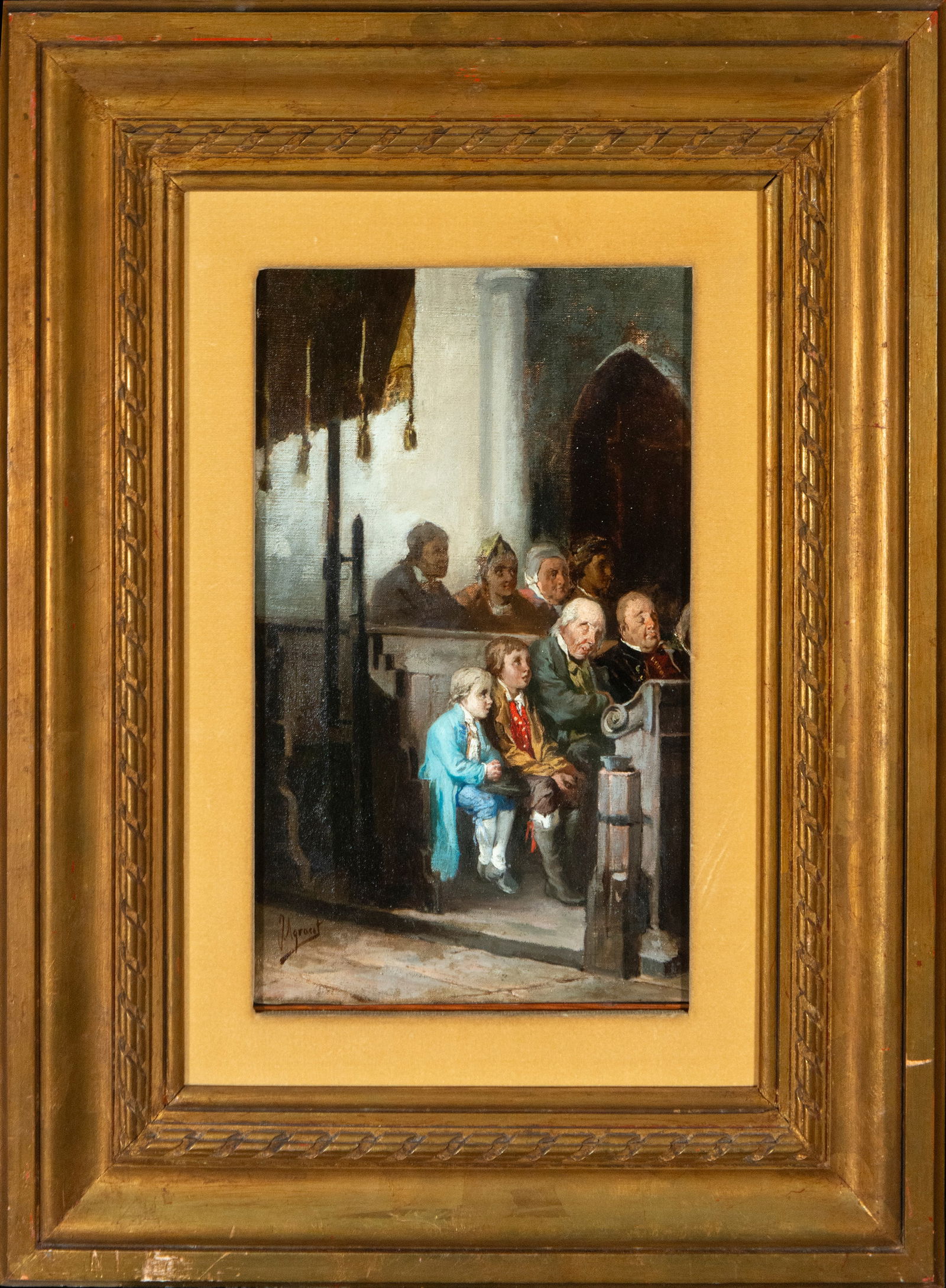 Figures at Mass. Signed J-Agrasot. Spanish Costumbrista School. 19th Century: Oil on canvas. Dimensions: 37 x 23 cm; framed: 63 x 48 cm. A church interior scene depicts figures seated on a pew, including elderly people, children, and ladies. The composition, characterized by it
