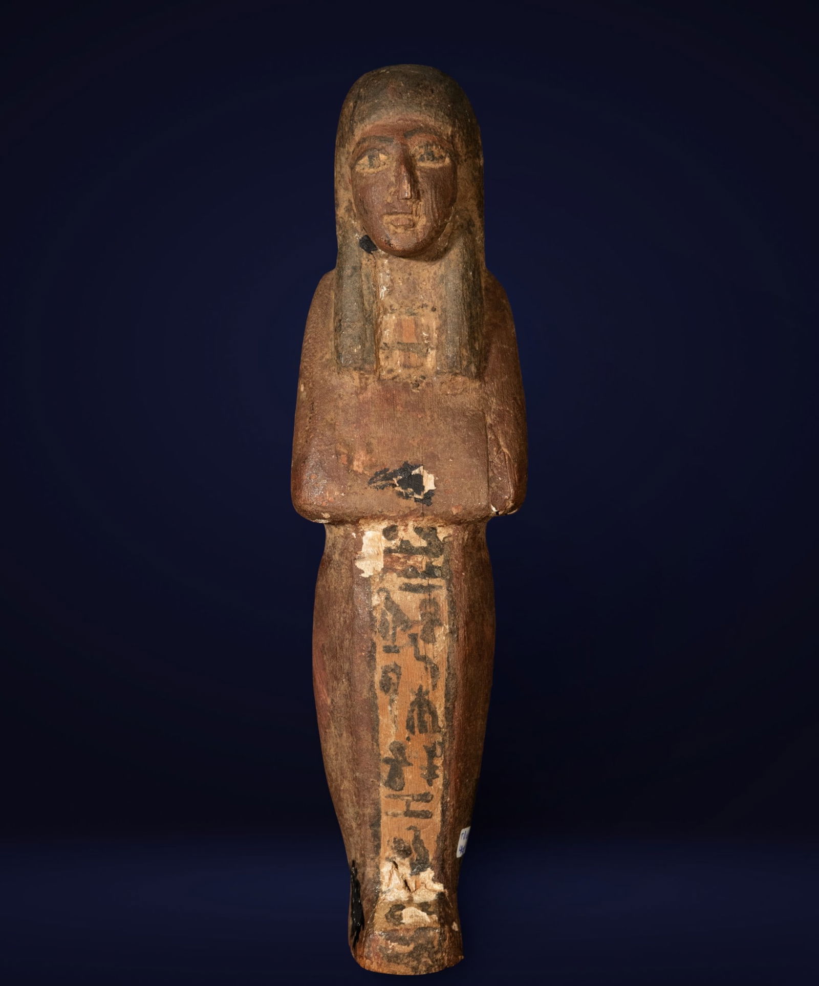 Exceptional Egyptian Ushabti, Ancient Egypt, Late Period, 1st century BC: Made of sycamore wood, retaining most of its original polychromy. Dimensions: 36 x 13 cm. Provenance: important private Spanish collection.