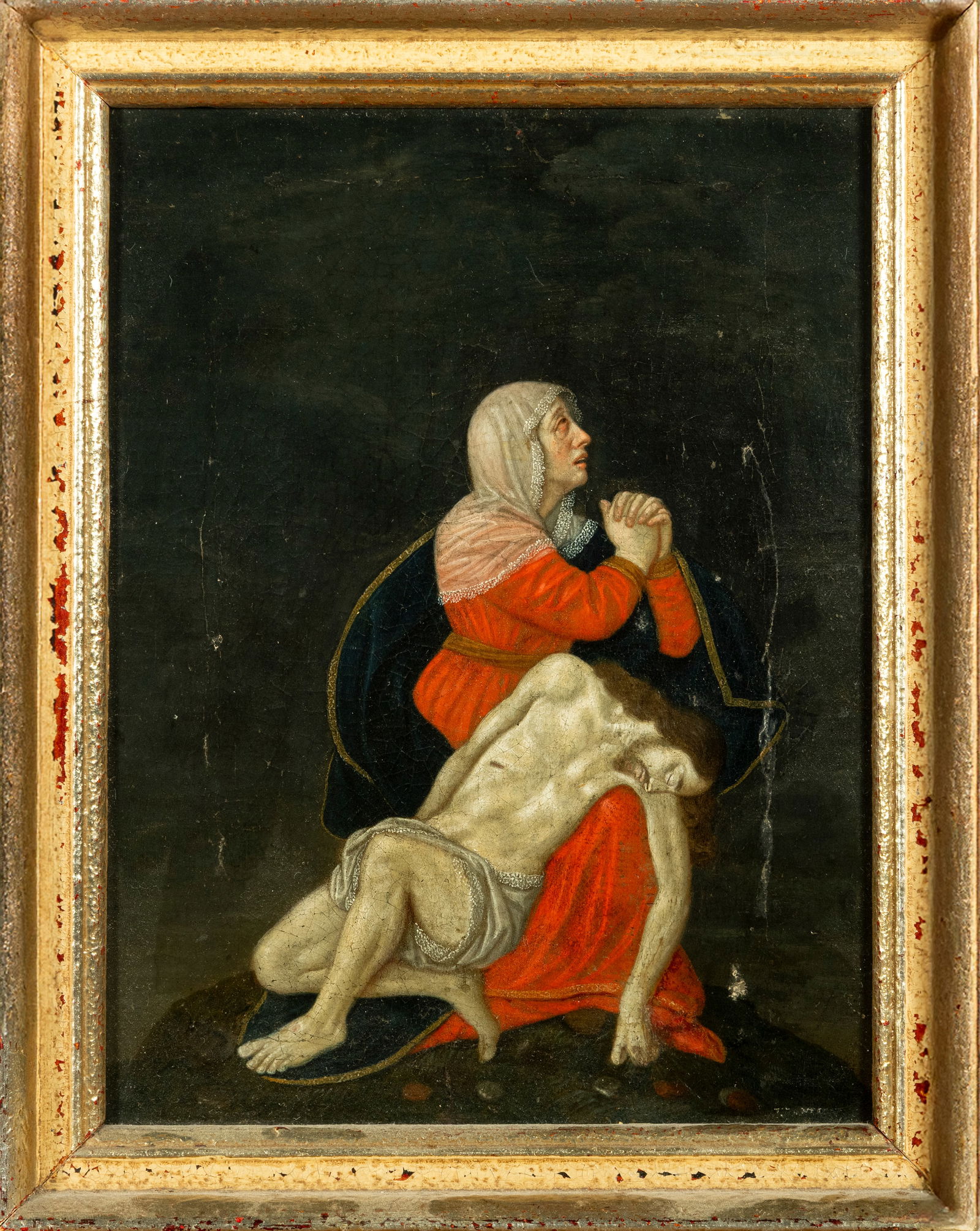 The Pietà. Italian School. Signed and dated 1755.: Oil on canvas mounted on panel. Dimensions: 26 x 20 cm. Devotional composition depicting the Virgin Mary kneeling, dressed in a crimson robe and blue mantle with gold edging, her hands clasped in pray
