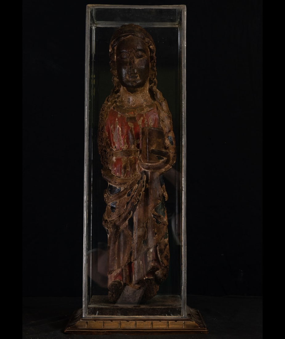 Romanesque Saint John the Evangelist from the end of the 11th century - beginning of the 12th: Remains of polychrome, measures: 61 x 16 x 11 (sculpture), 69 x 29 x 27 cm (urn).