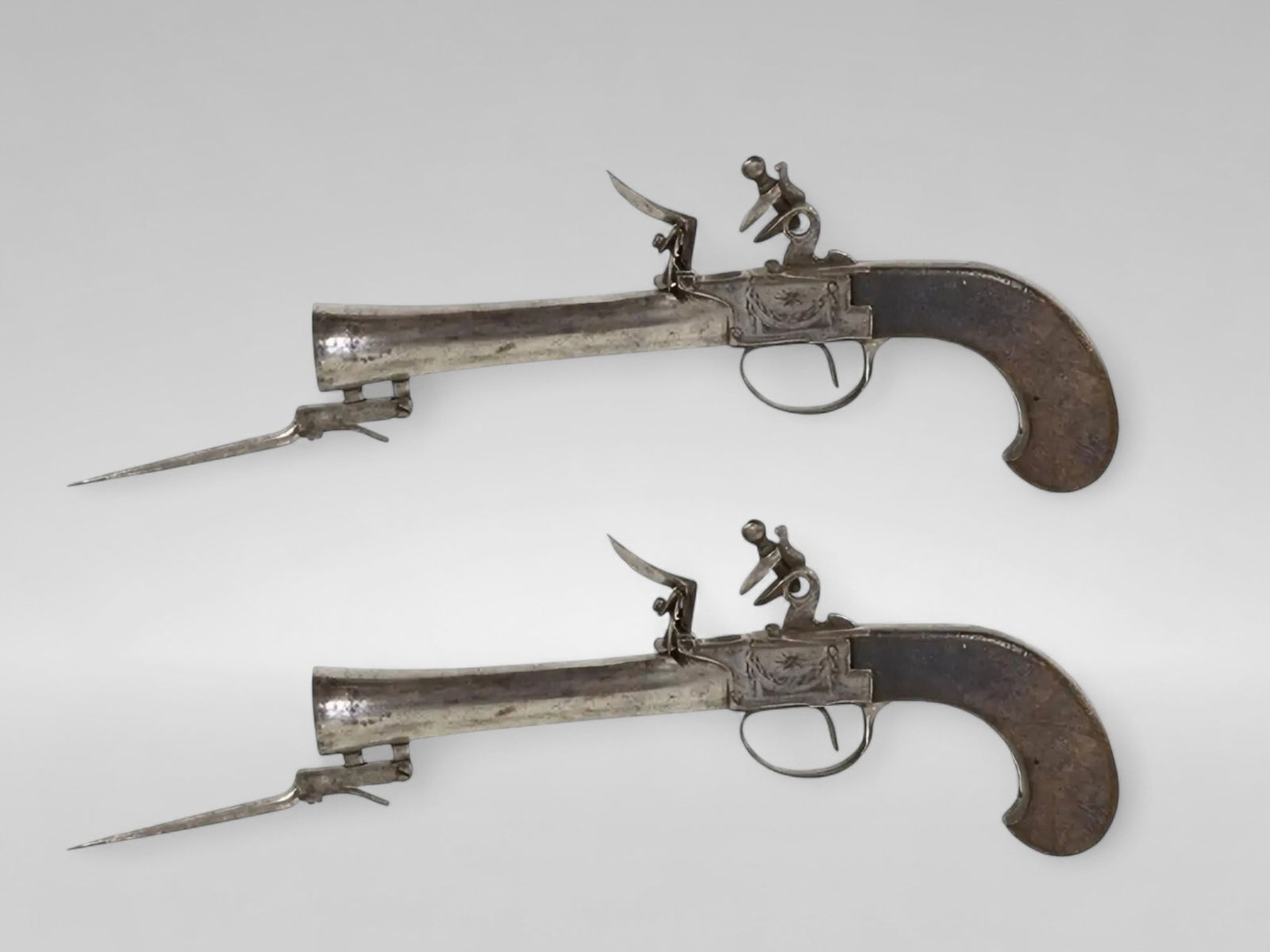 Pair of muzzle-loading travel pistols with flintlock and tilting bayonet, European School, 19th (1 of 8)