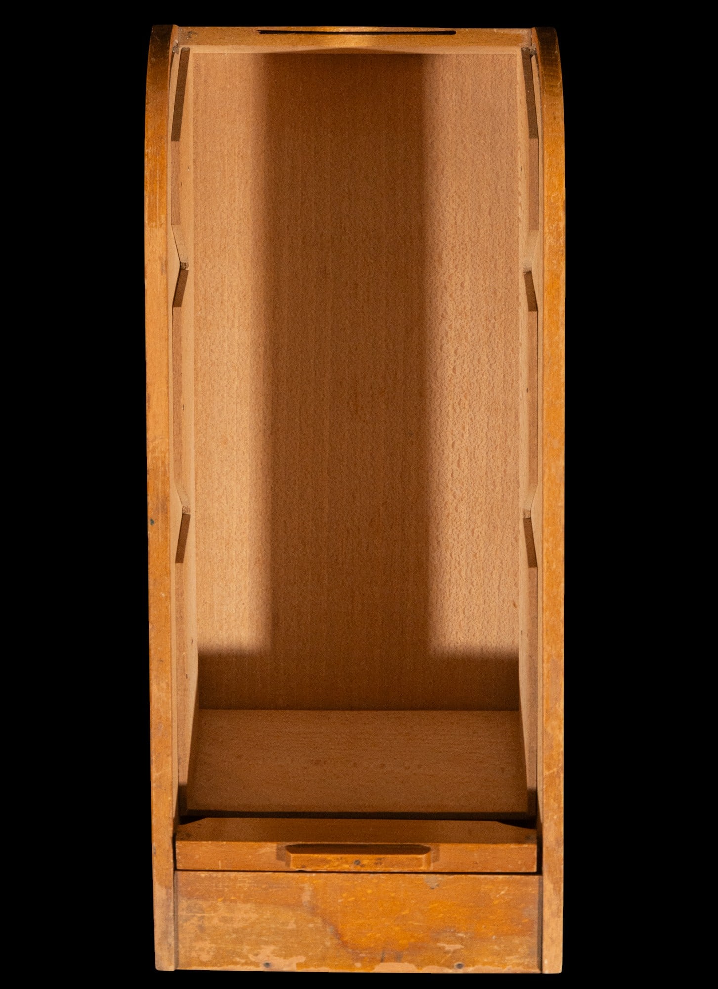 Roller shutter filing cabinet. Spain, late 19th - early 20th century.: American oak filing cabinet. Dimensions: 37 x 16 cm. This functional piece of furniture features a vertical structure with clean lines and compact proportions, conceived to optimize storage in small s