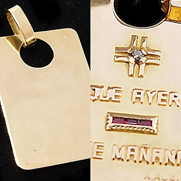 Plate pendant “Plus qu'hier, moins que demain??, Signed A. Augis, 20th century: 18-karat (750) gold, crafted using a polished plaque technique with stone setting. Measures 3.0 x 2.7 cm; weight 3.6 g. This rectangular plaque pendant with gently rounded corners is made of yellow go