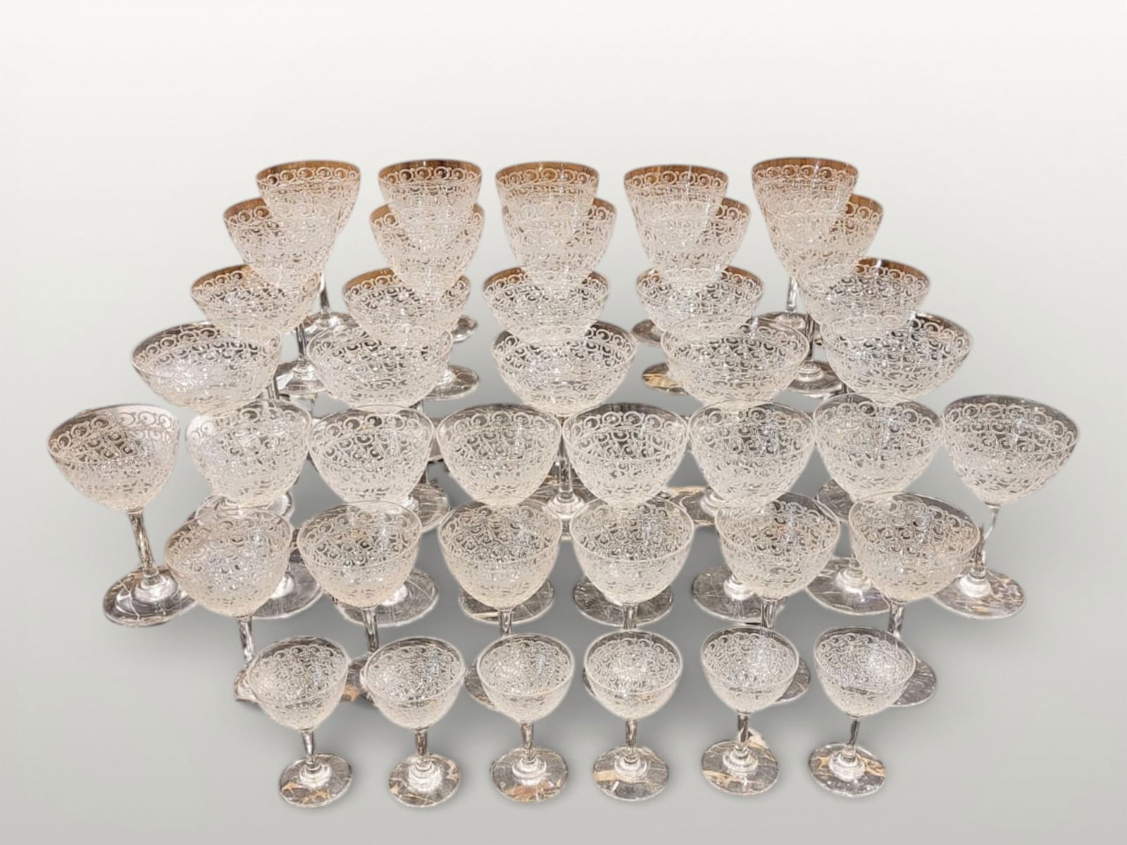 Rohan crystal glasses from Baccarat, France, 1930s. Set of 41: Baccarat Rohan Crystal Glassware Set, 41 Pieces, 1930s – France. Elegant Baccarat crystal glassware set, consisting of 41 pieces, including a decanter and forty glasses of various colors.